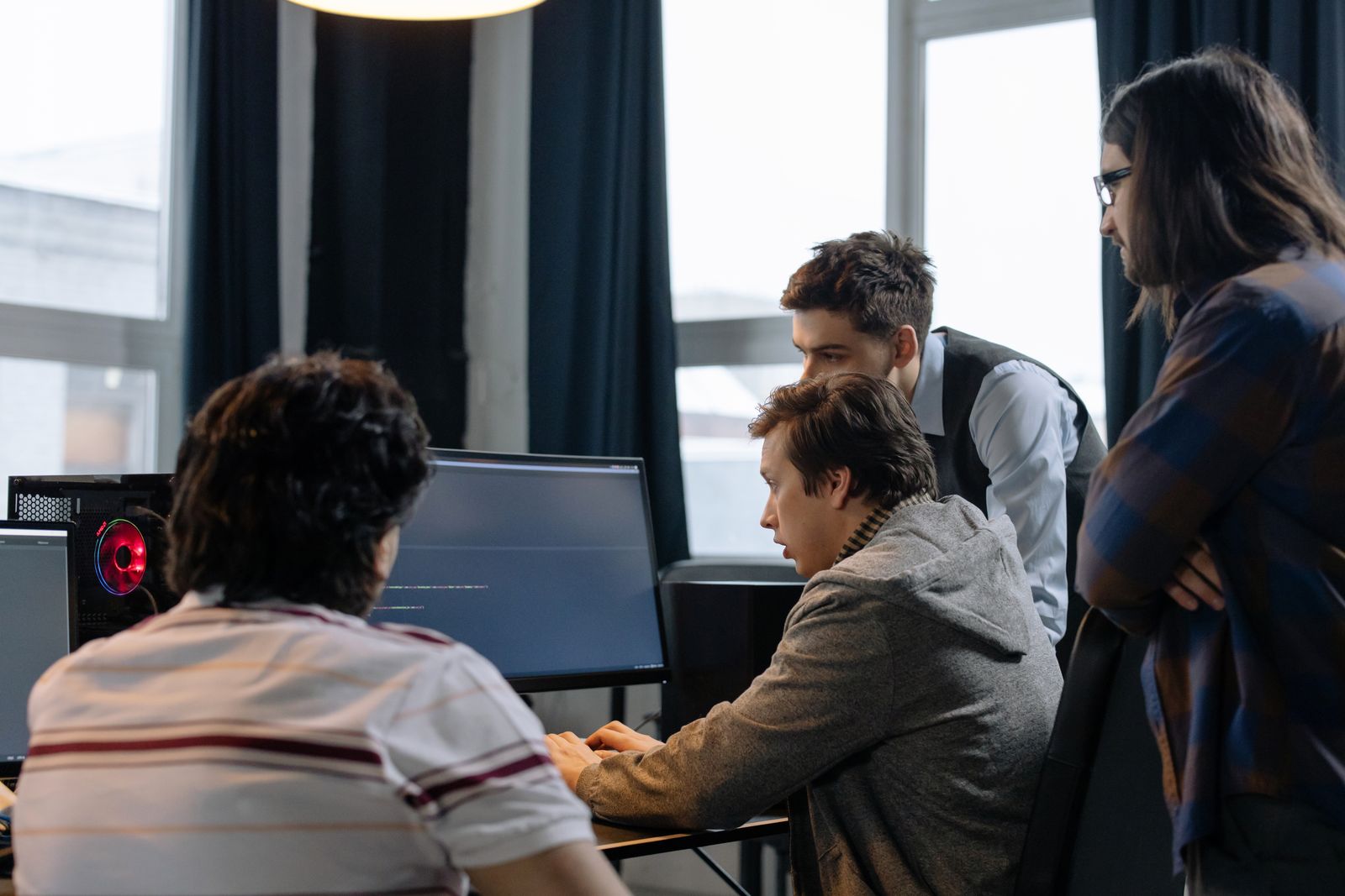 Codemarine Technologies development team reviewing code together